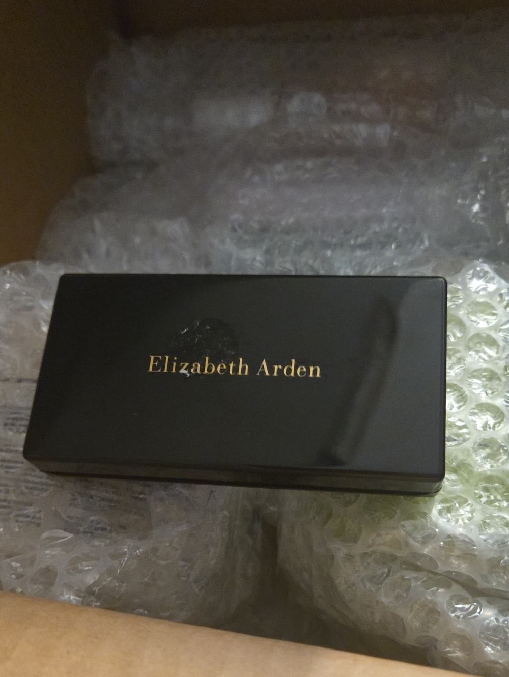 Elizabeth Arden Black Compact with Gold Logo